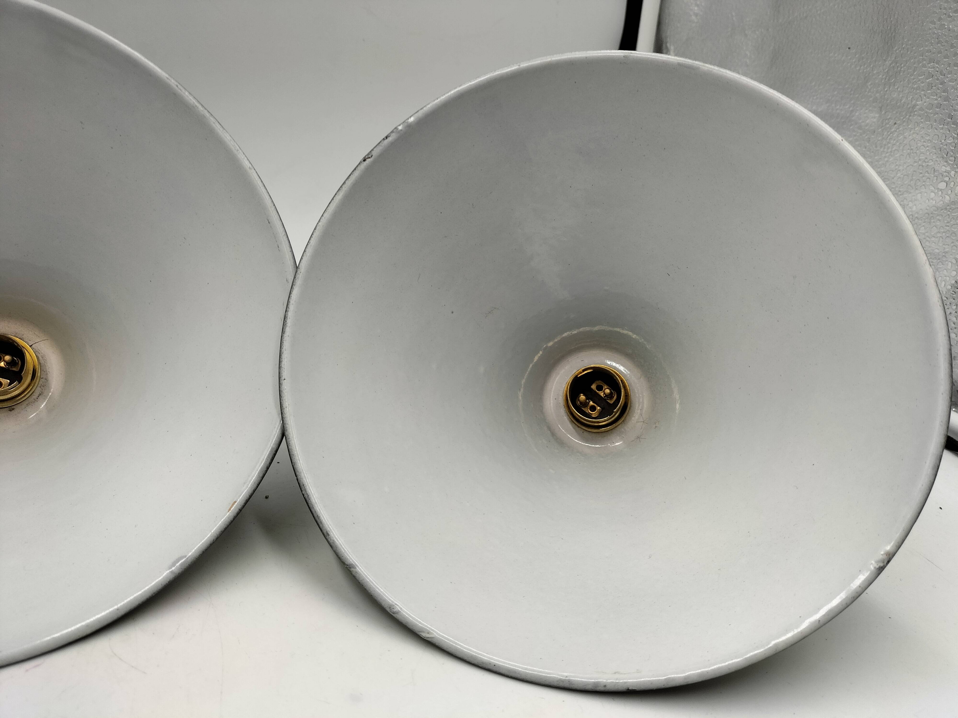 Enamelled sheet metal suspensions