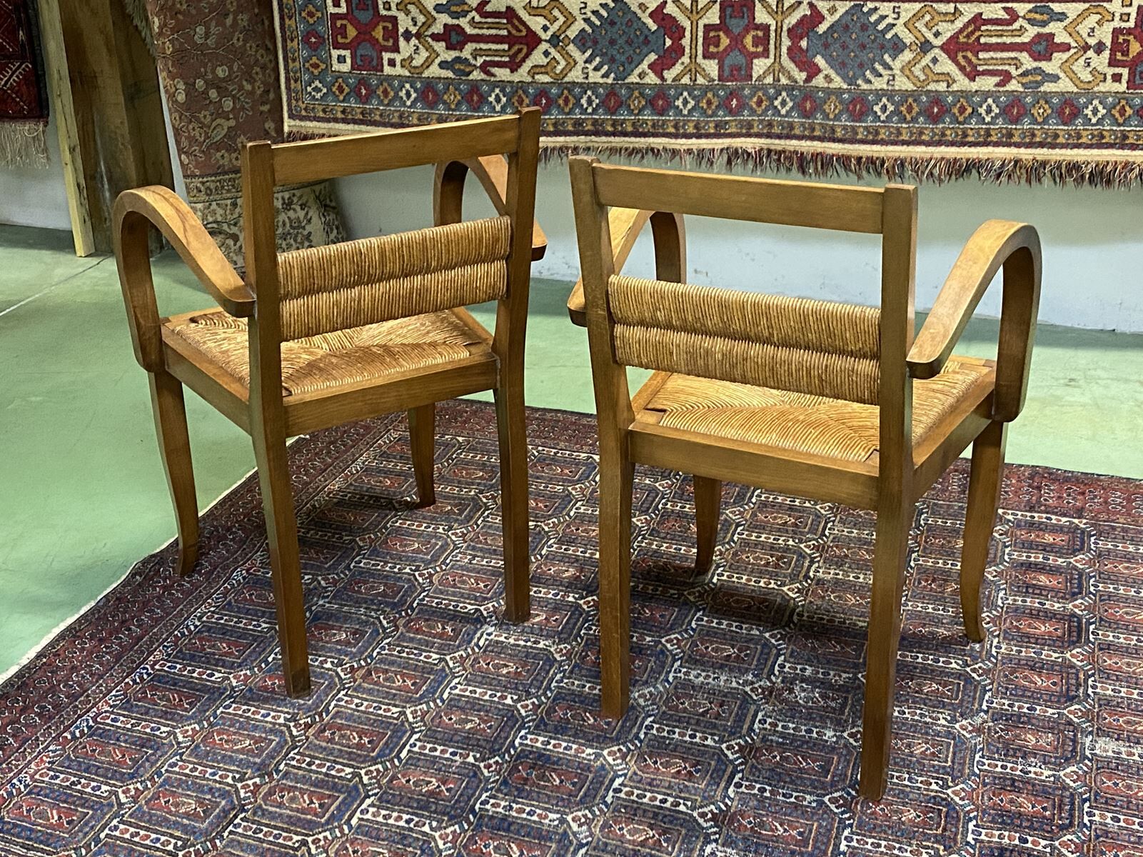 Pair of beech and straw armchairs