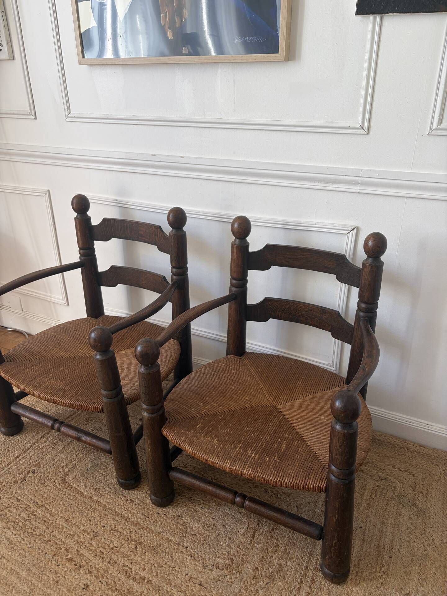 Paire de fauteuils en bois et paille  Charles Dudouyt 
