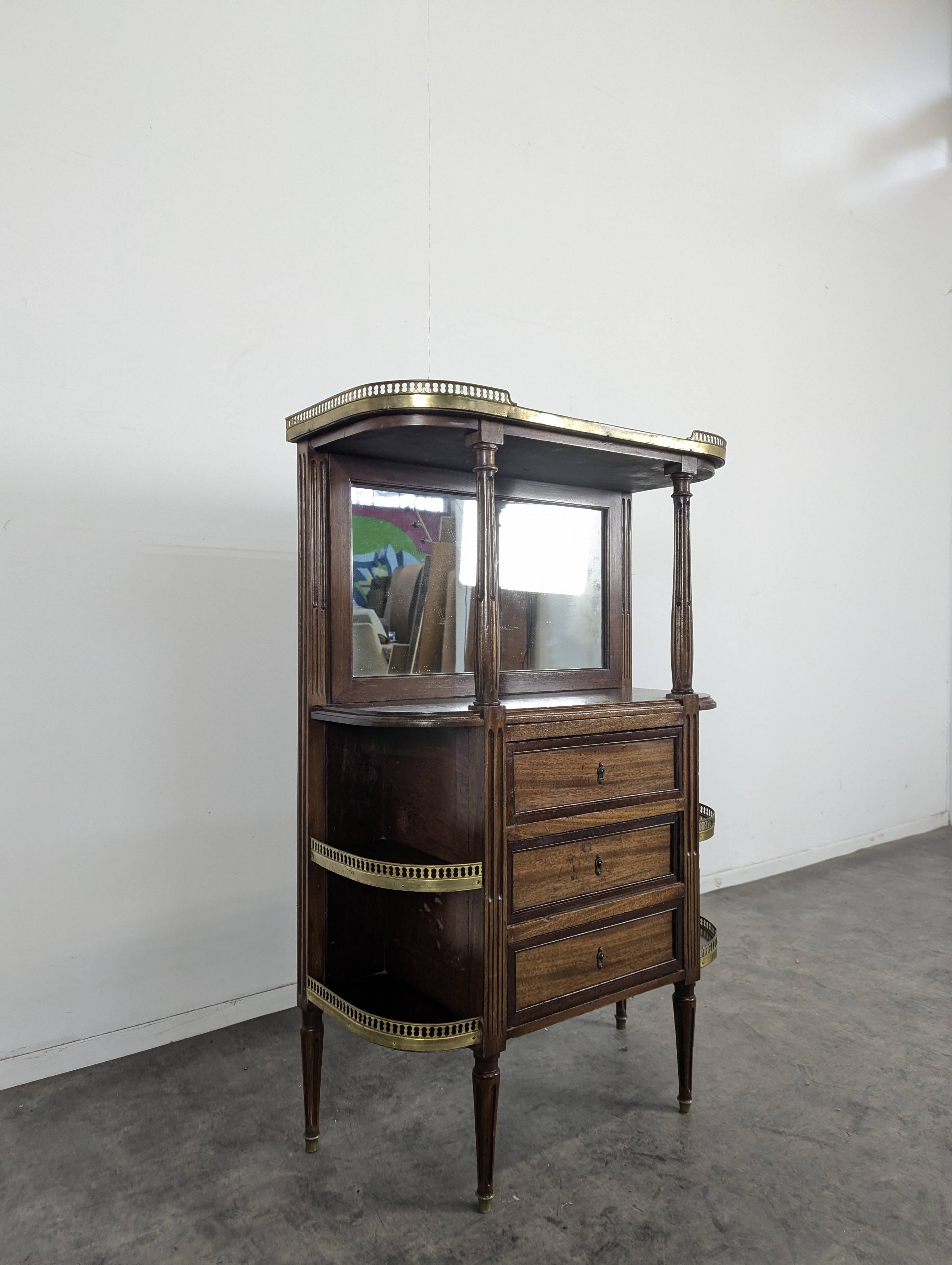 19th-century bar in Louis XVI style made of mahogany.