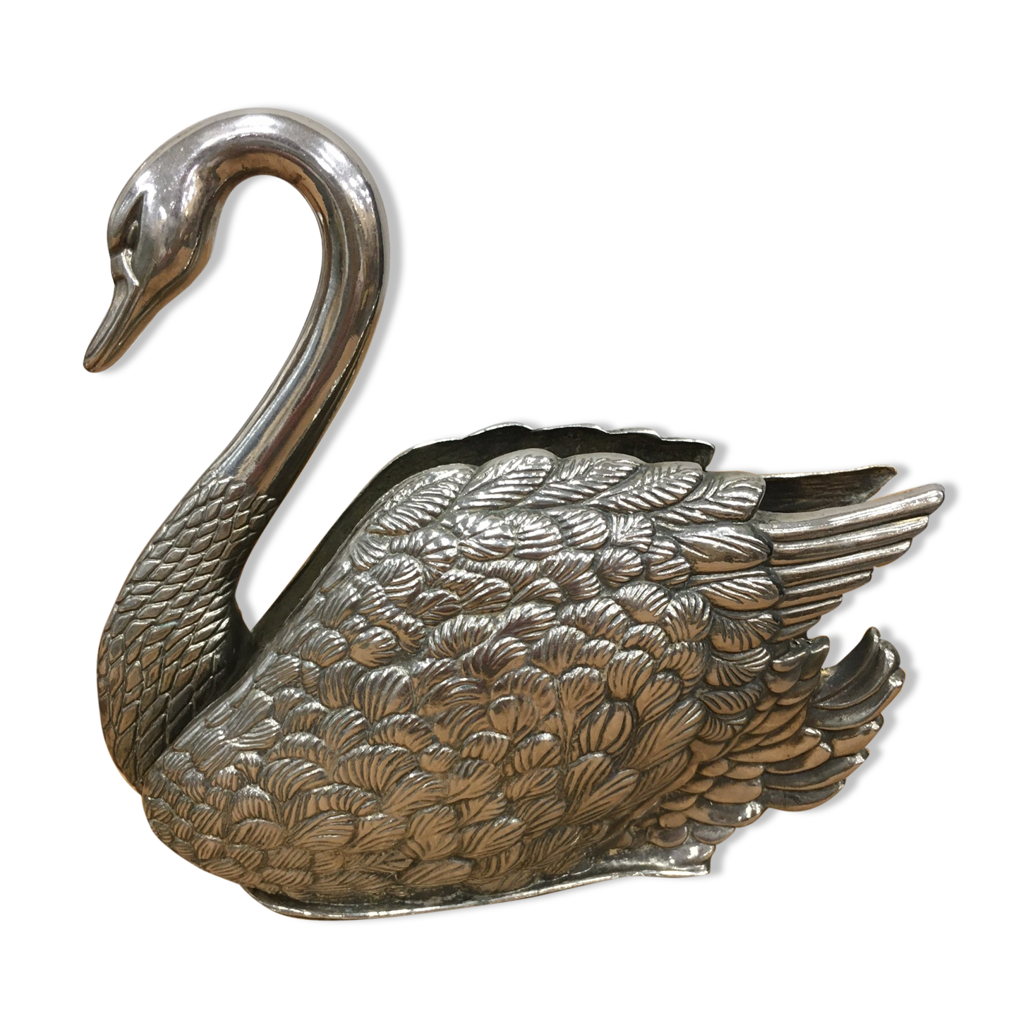 Swan wears silver metal letters