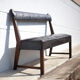 Antique wood bench and black imitation leather