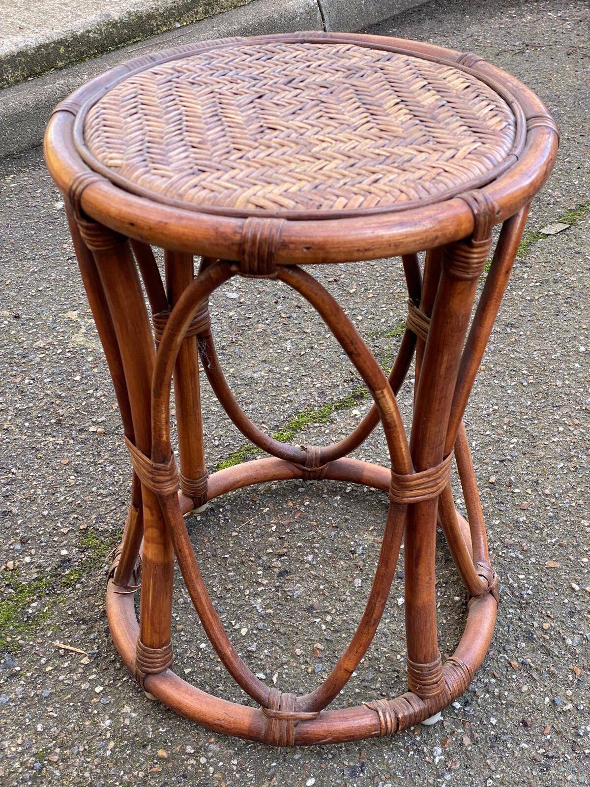 Vintage round stool in bamboo, rattan, and wicker.