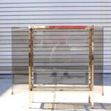 Post-modern low window in brass and smoked glass, 1970s