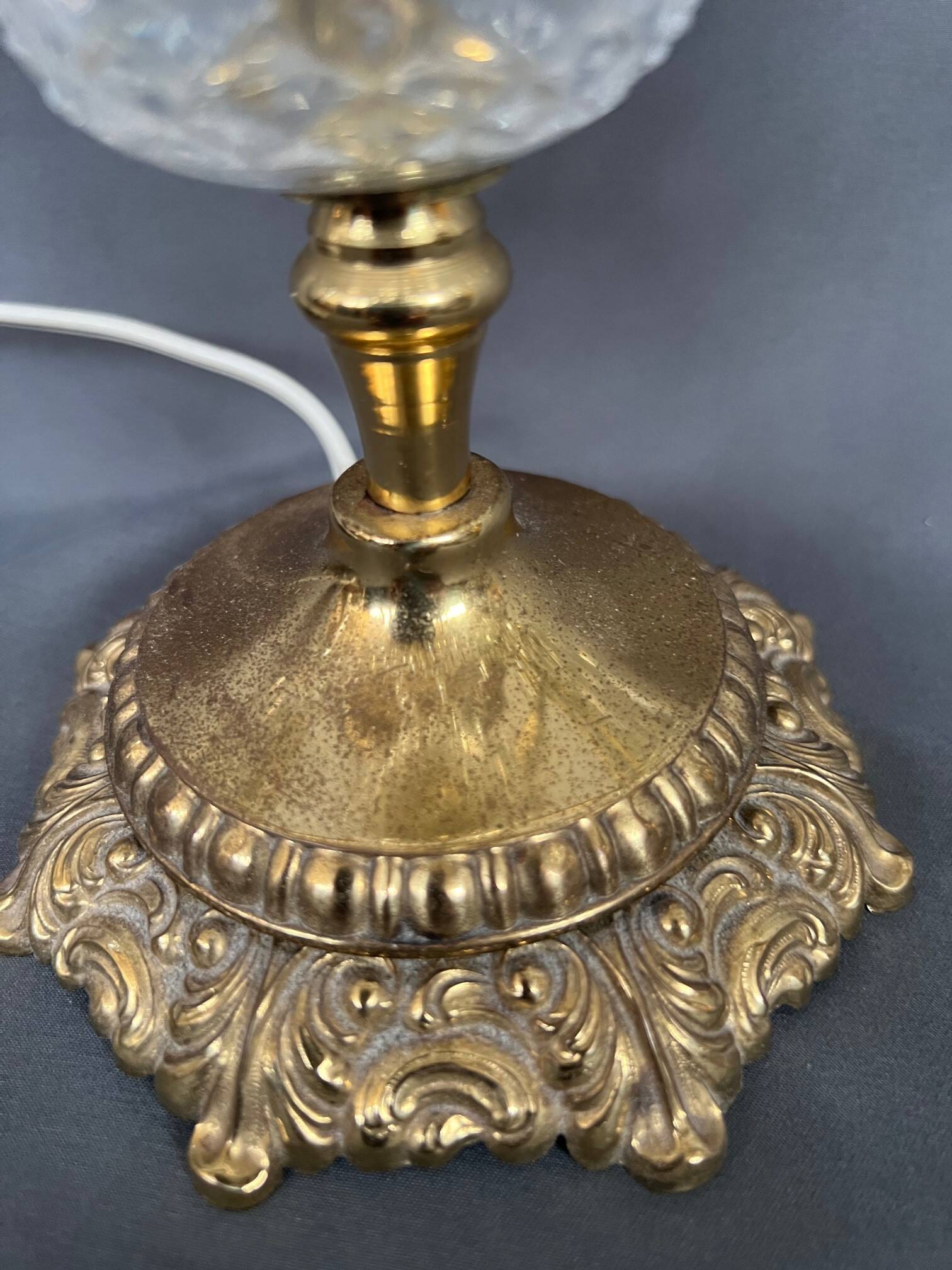 Girandole. Brass, crystal, bronze.