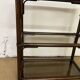 Rattan and smoked glass bookcase shelf
