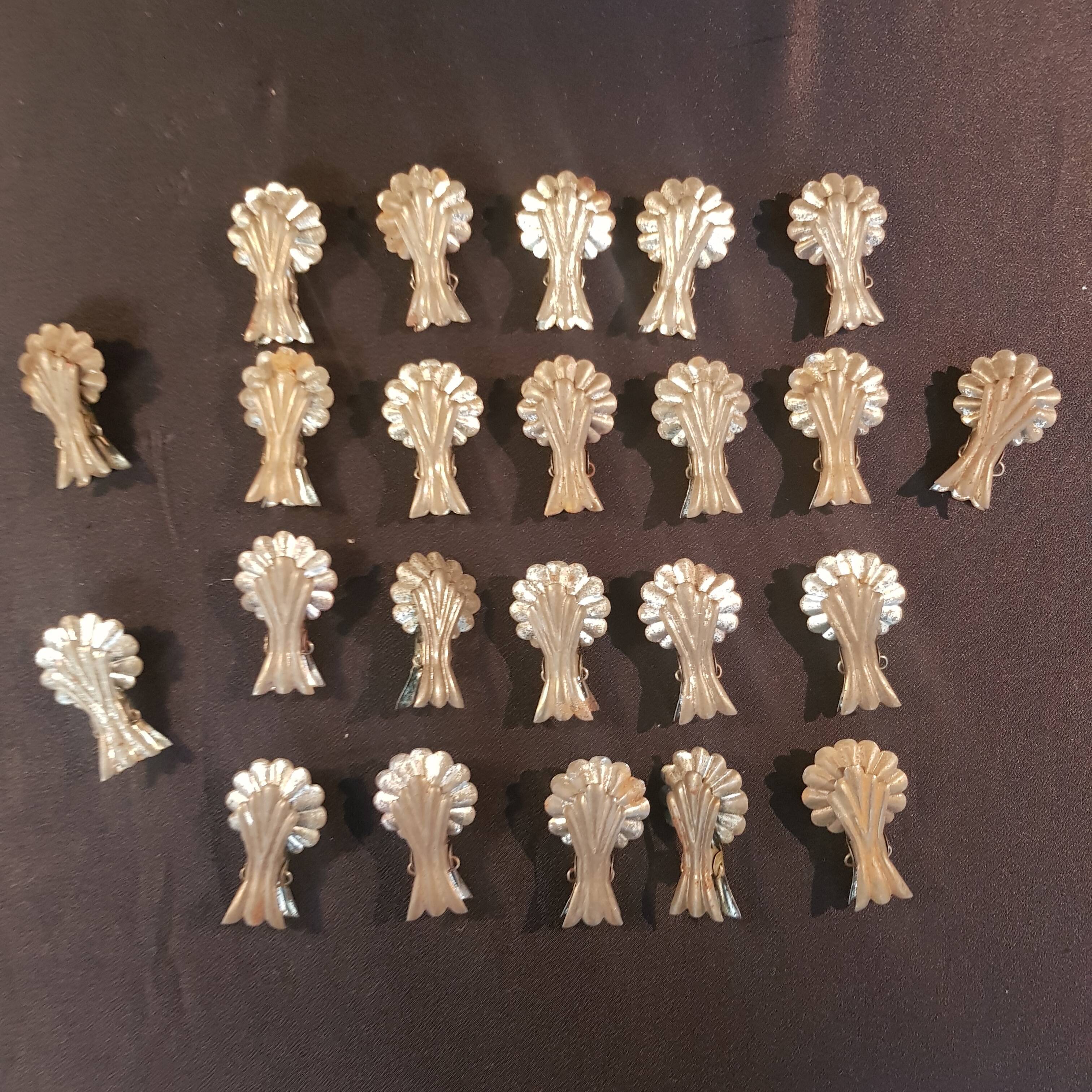 Set of 23 candle tongs