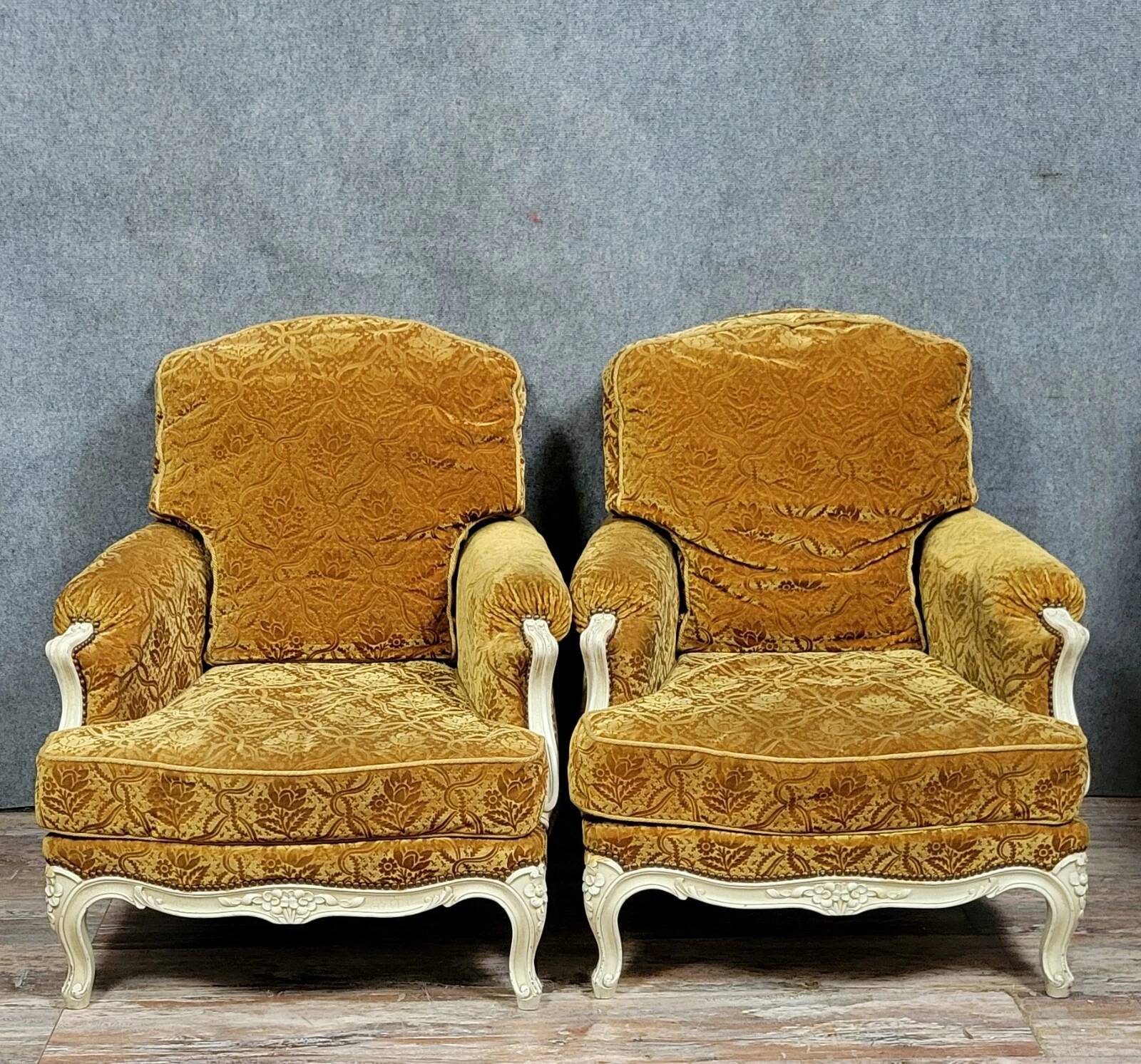 Pair of Louis XV style Bérgères in lacquered wood, 19th century