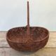 Former collection in braided wicker rattan with cove decoration vintage basket