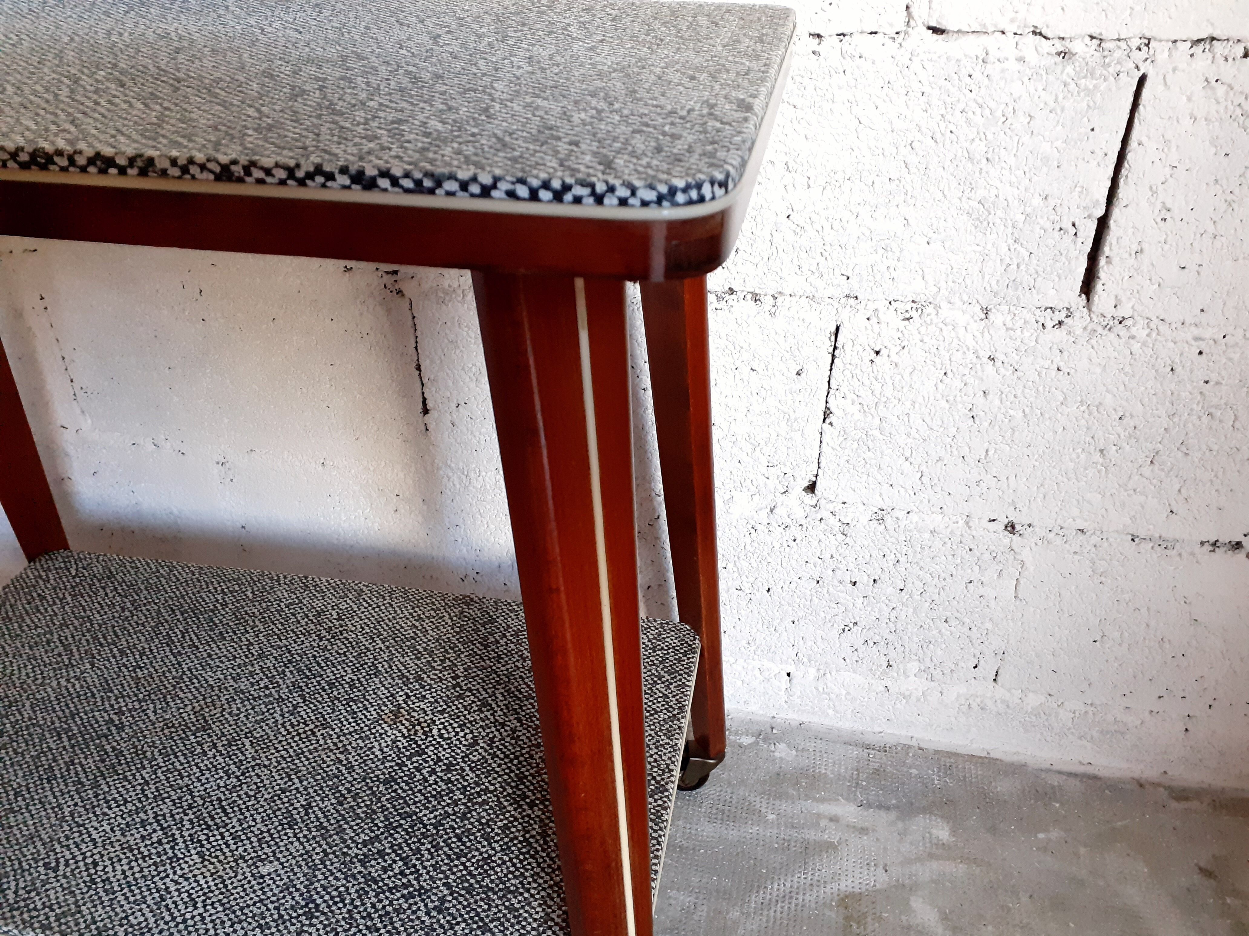 Vintage multifunction service / side table on wooden wheels 50 years 60