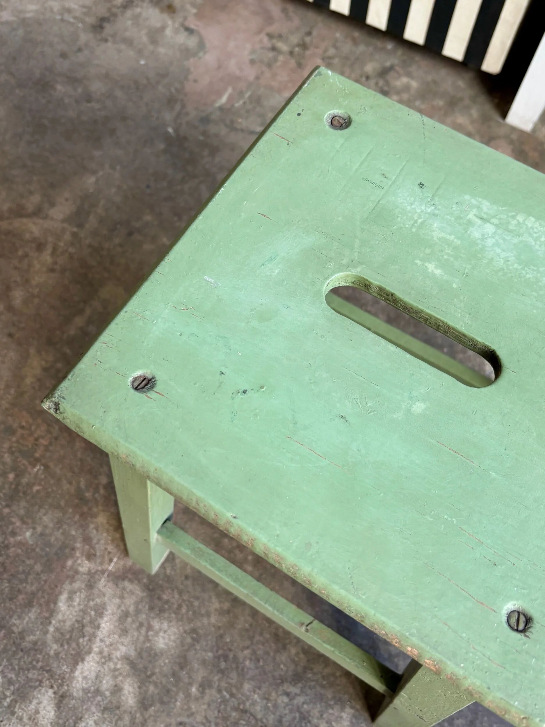 Green wooden stool