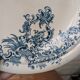 Shallow round plate Boch Frères model Regent with arabesque and foliage decoration.