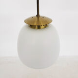 Set of two milk glass and brass design lights