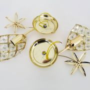 Pair of vintage floral wall sconces in gold metal and tassel