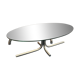 Oval glass coffee table with chrome legs, vintage 70s design.