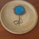 Enameled pottery plate