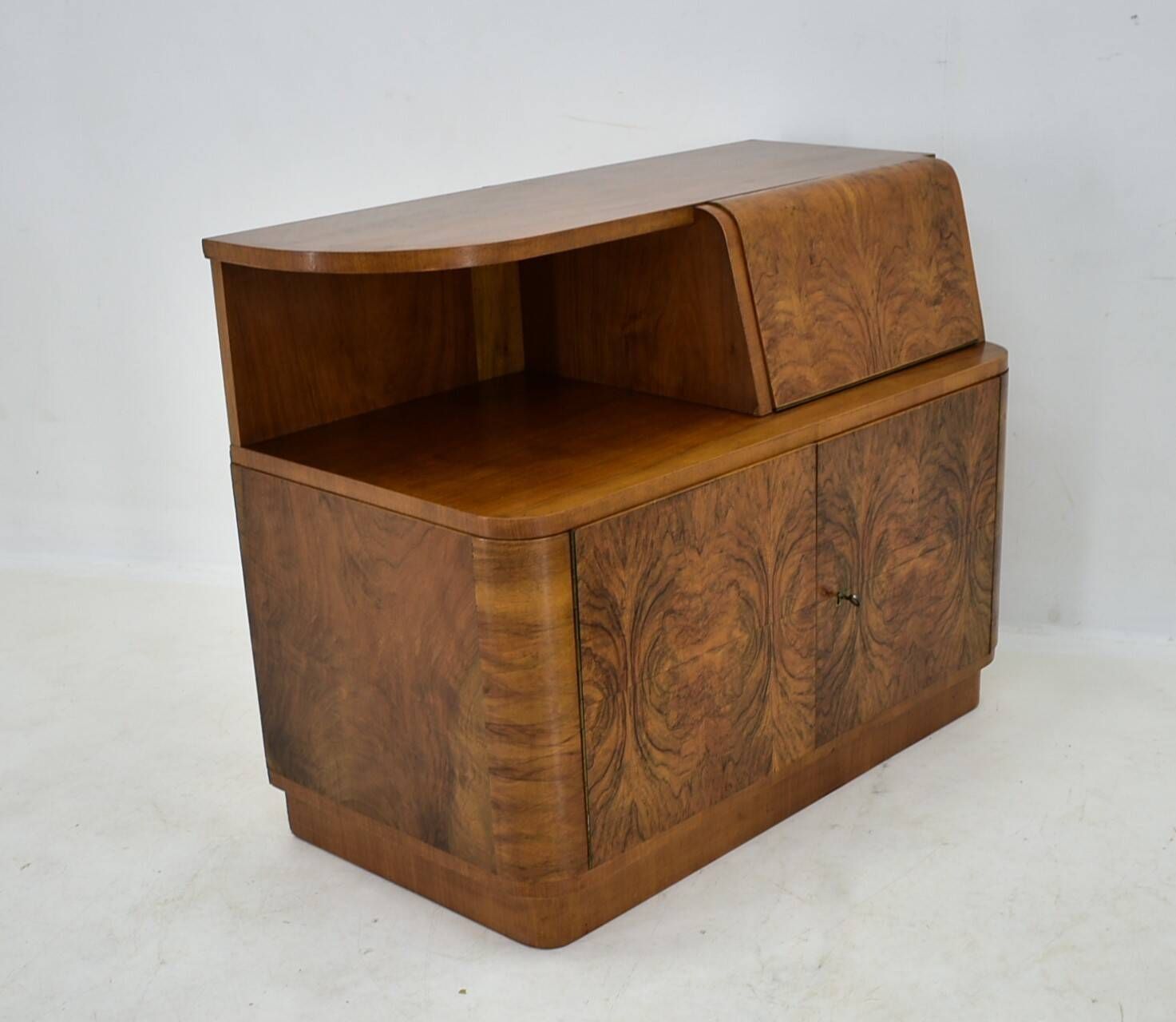 Art Deco cabinet from 1940 made of walnut for UP Závody, Czechoslovakia.
