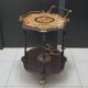 Marquetry trolley on wheels