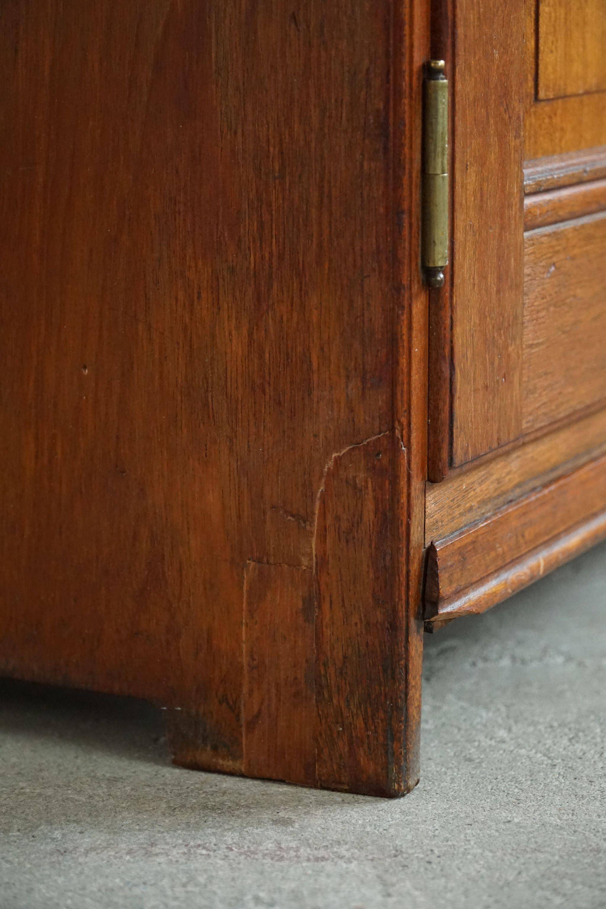 Rare high cabinet in teak by Martin Nyrop for Rud. Rasmussen, Denmark, early 20th century.
