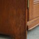 Rare high cabinet in teak by Martin Nyrop for Rud. Rasmussen, Denmark, early 20th century.