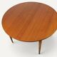 Round extendable dining table in teak – 1960s