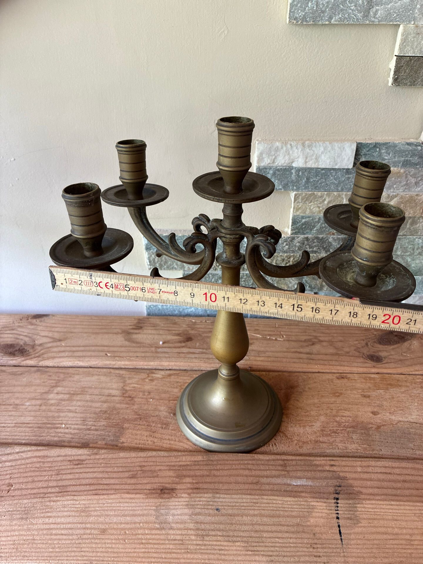 Pair of large 5-light candlesticks in patinated brass, classical style.