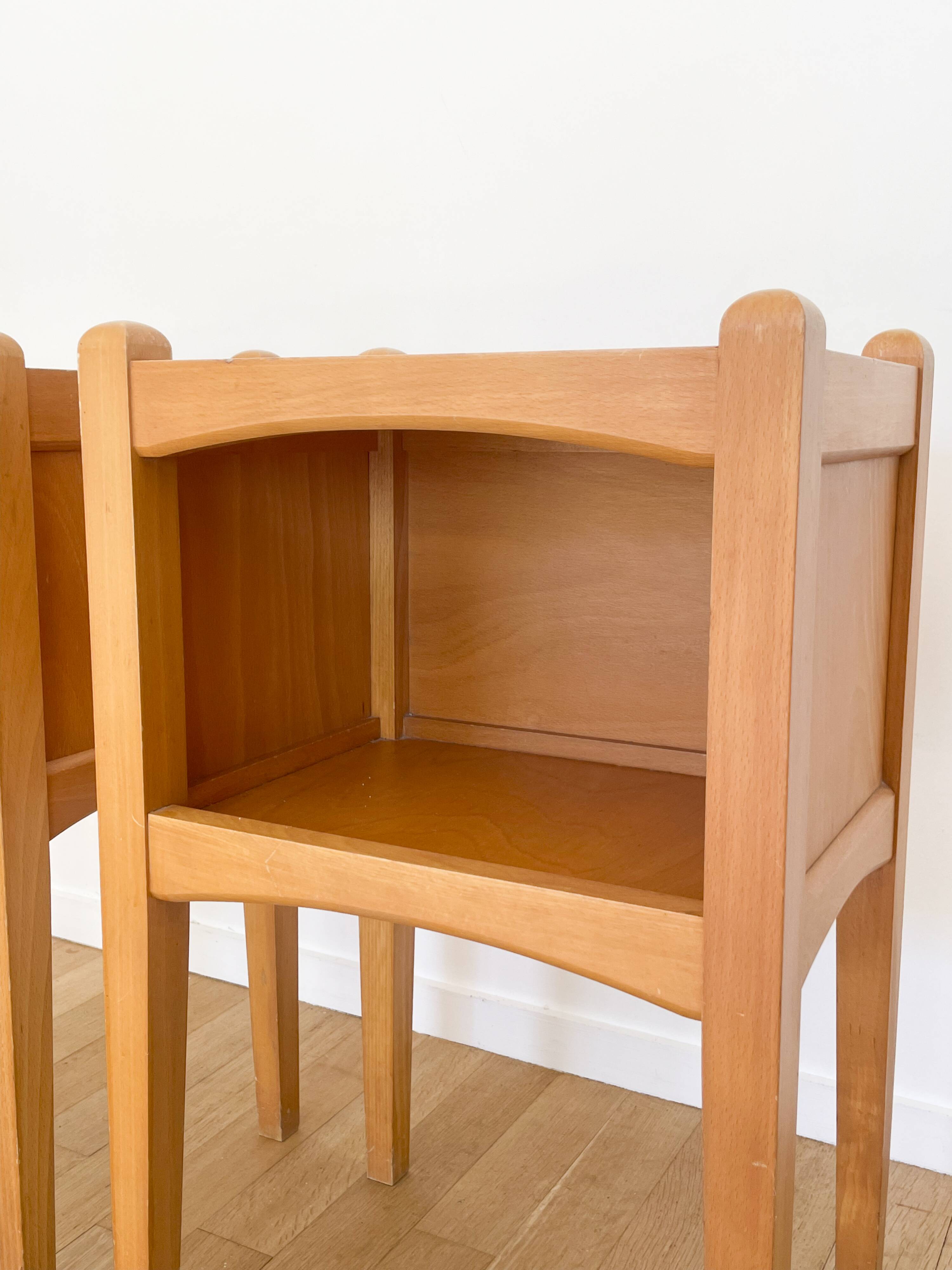 Pair of light wood bedside tables