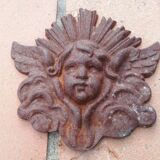 2 cast iron decorations