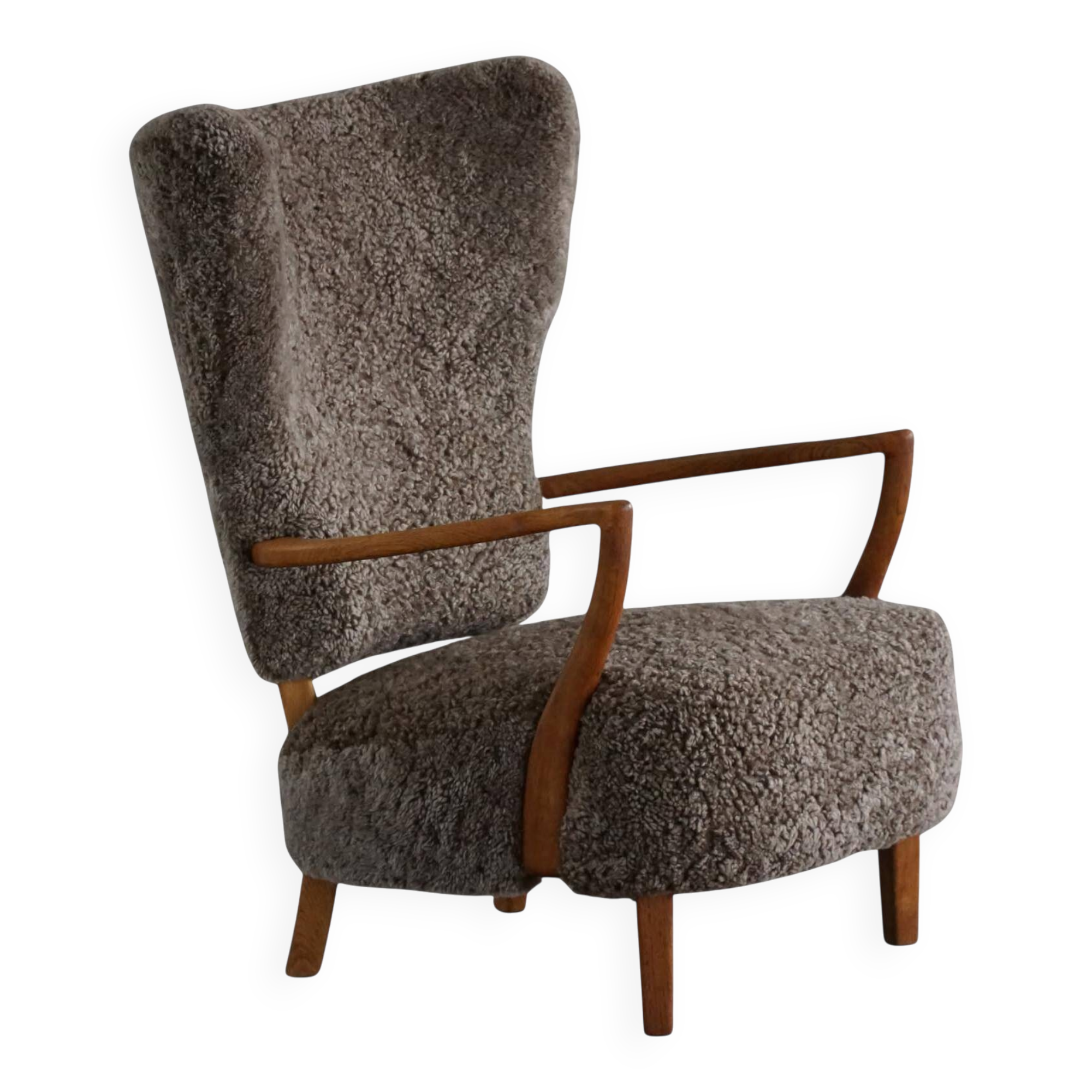 High-backed chaise longue in oak and lambswool, Danish Modern, Viggo Boesen, 1950s.