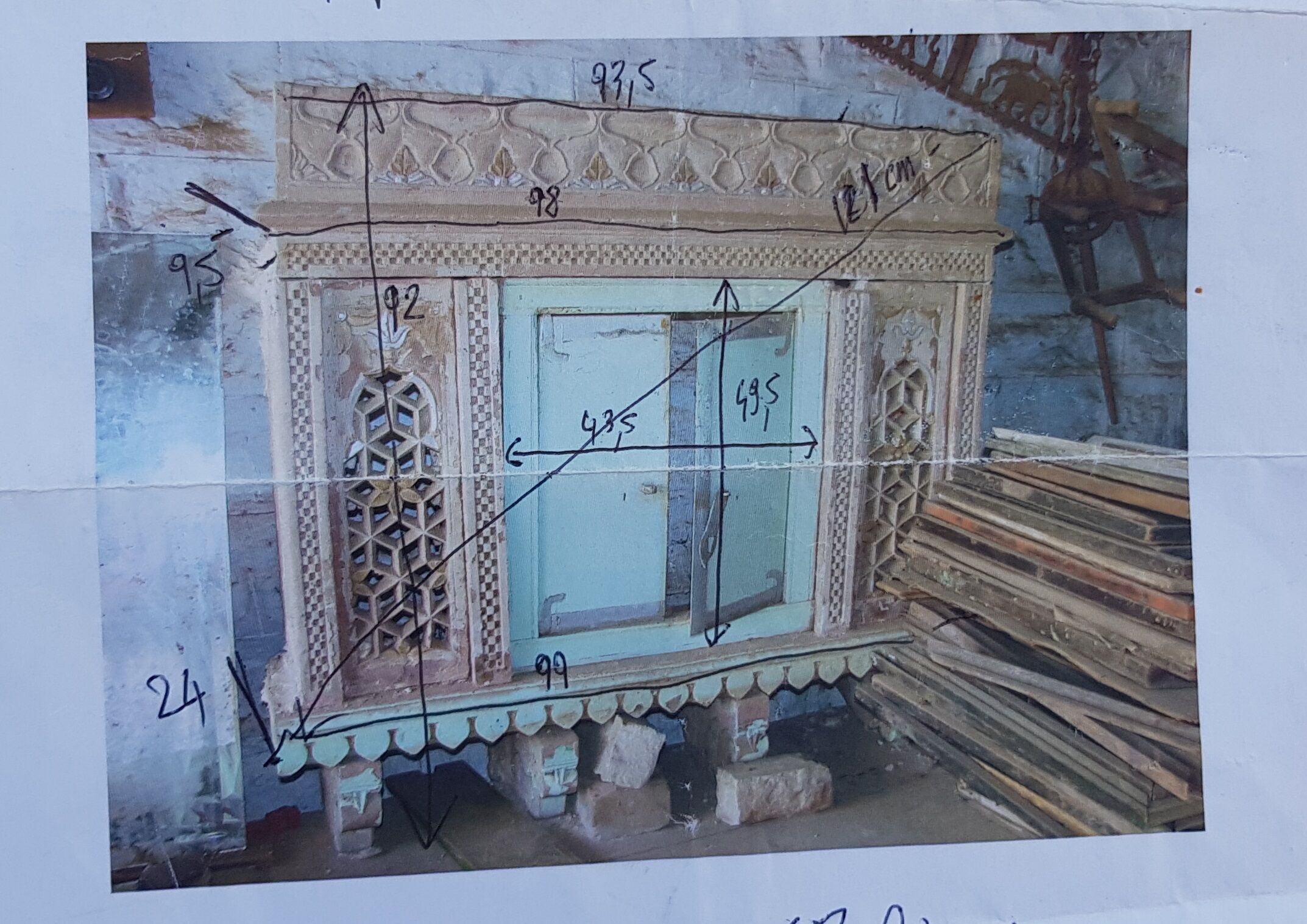 Fully hand-carved stone window with mirror