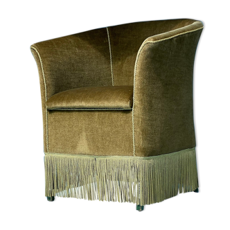 Olive green fringed armchair