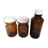 Trio of brown glass jars