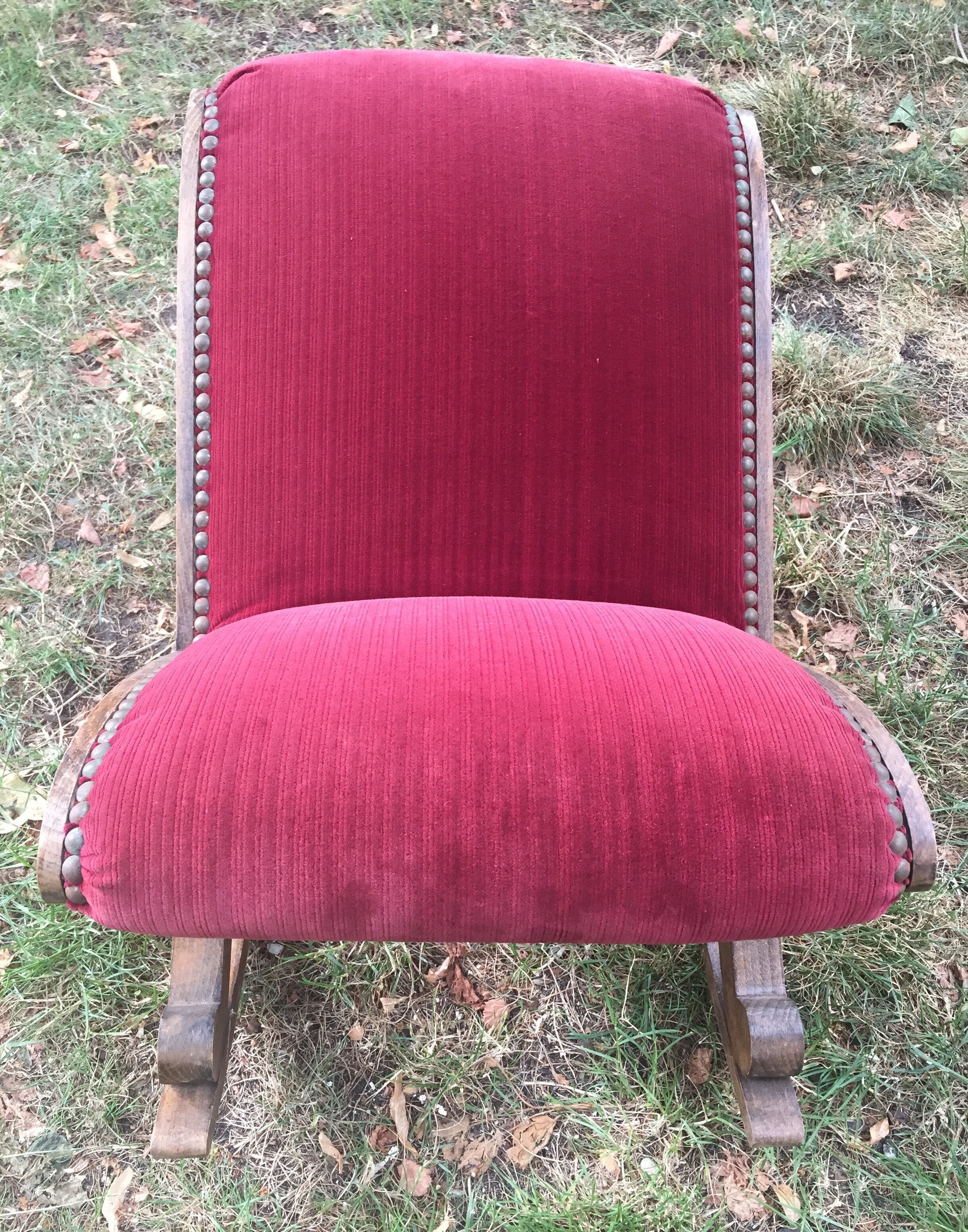 50s footrest in red velvet and scuplented wood
