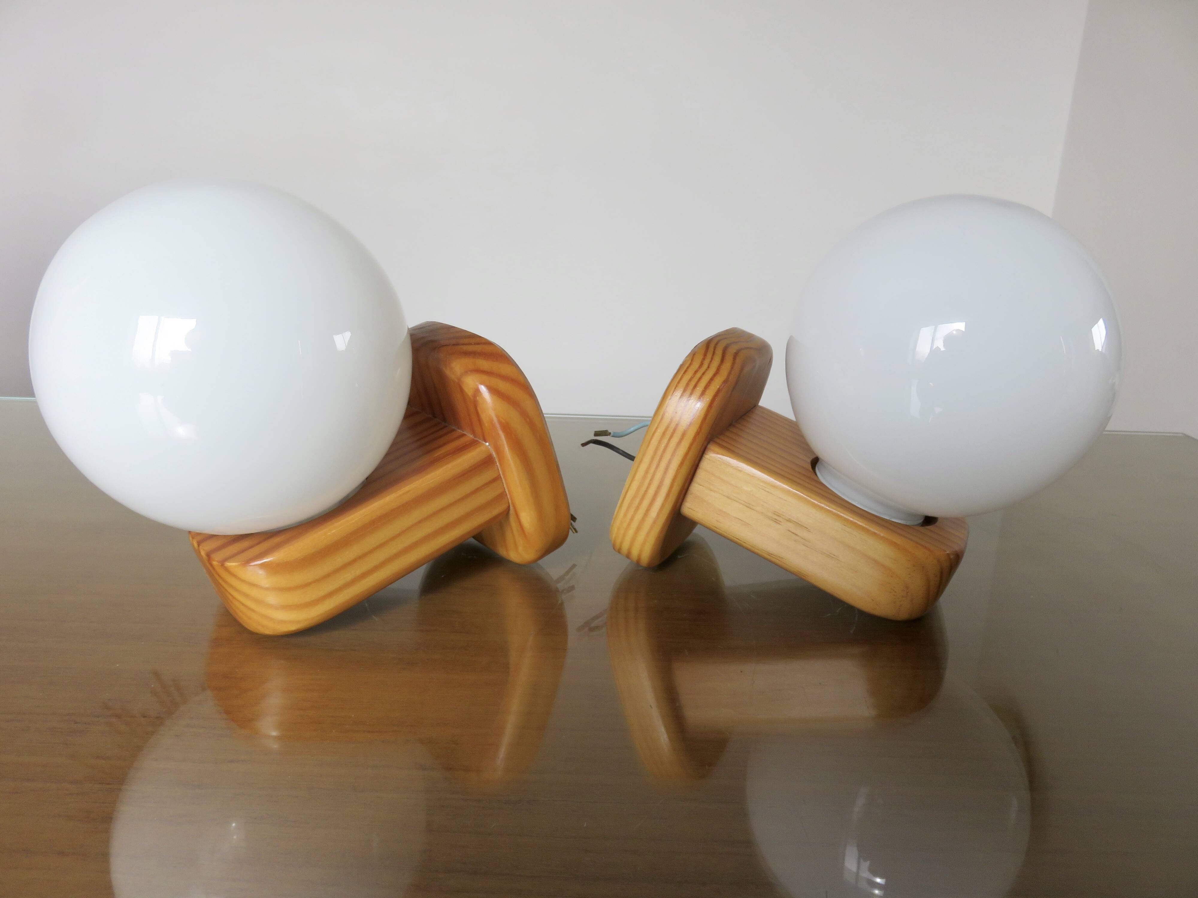 Pair of Scandinavian wall lights in pine and white opaline, 1980s.