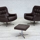 1970s, set of two swivel lounge chairs with footstool, leather.