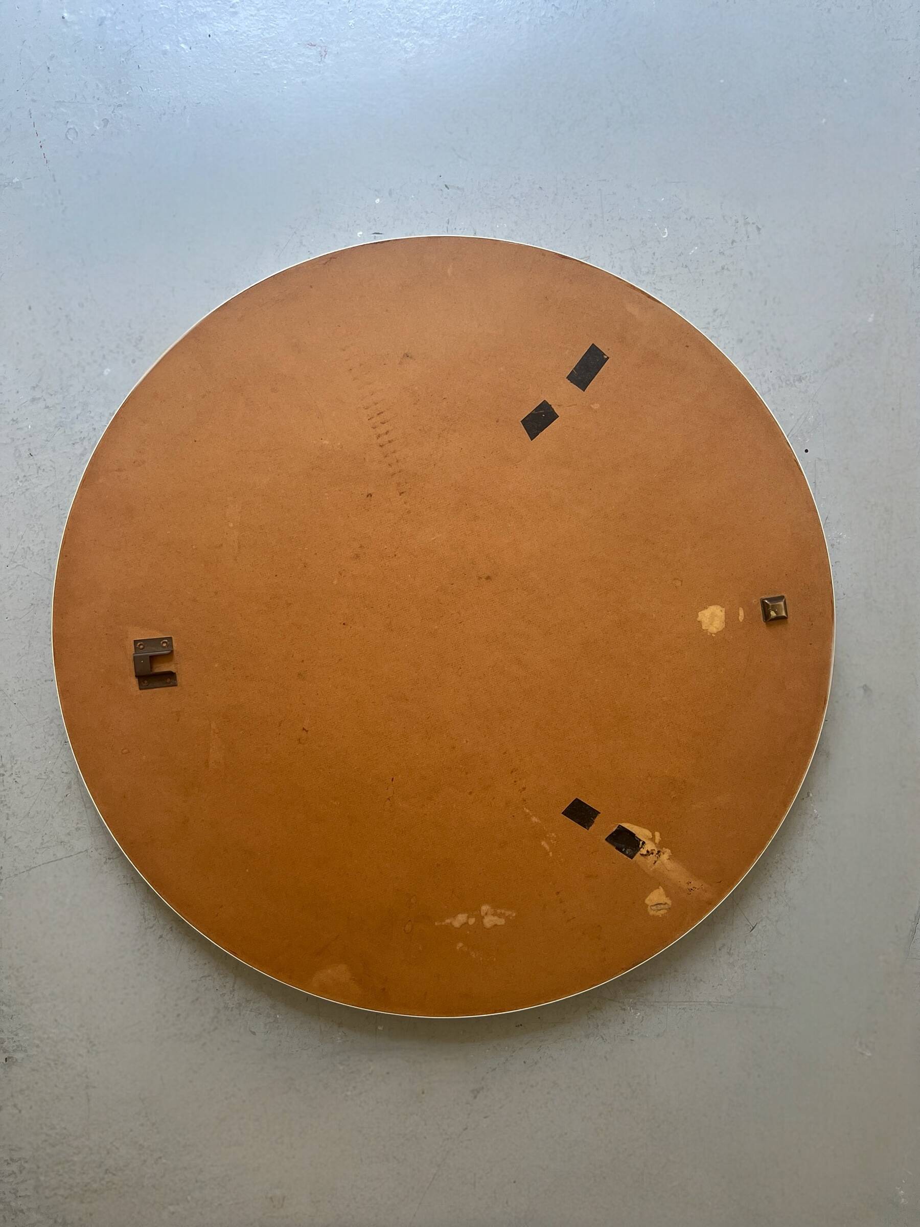 Large round white mirror space age design from around 1970.