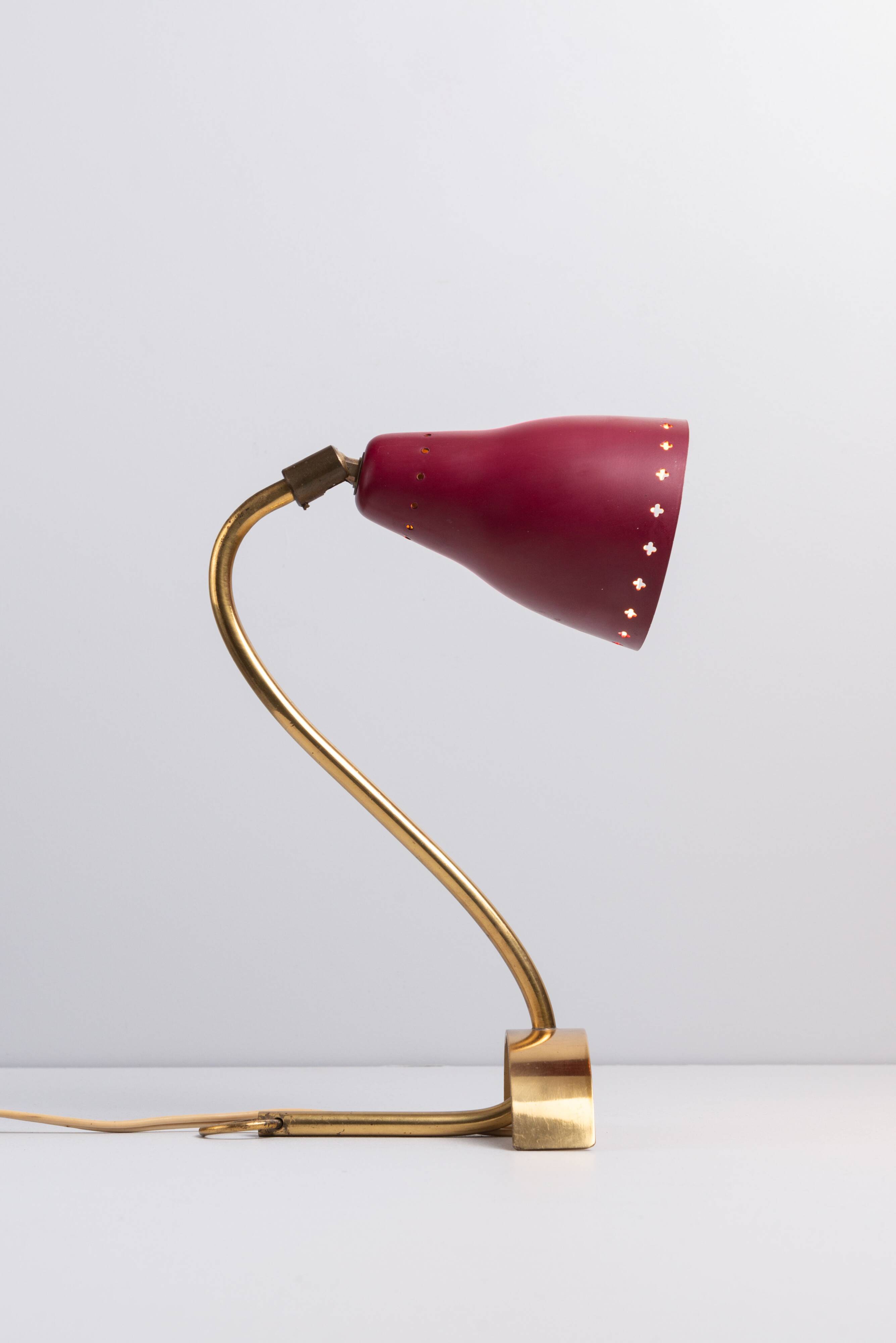 Brass wall lamp with perforated metal shade, 1950s, Sweden