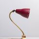 Brass wall lamp with perforated metal shade, 1950s, Sweden