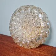 Amber glass honeycomb ceiling light, design by Helena Tynell, 1970.