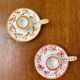 Mismatched duo of Italian ceramic candlesticks