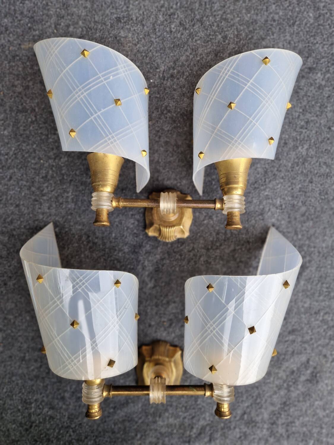 Pair of plastic and brass wall lights from the 60s/70s
