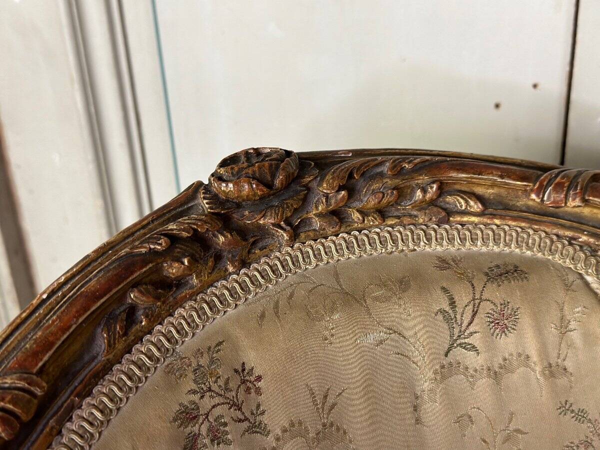 A Louis XV style child's bergère chair in carved and gilded wood, circa 1880