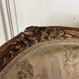 A Louis XV style child's bergère chair in carved and gilded wood, circa 1880