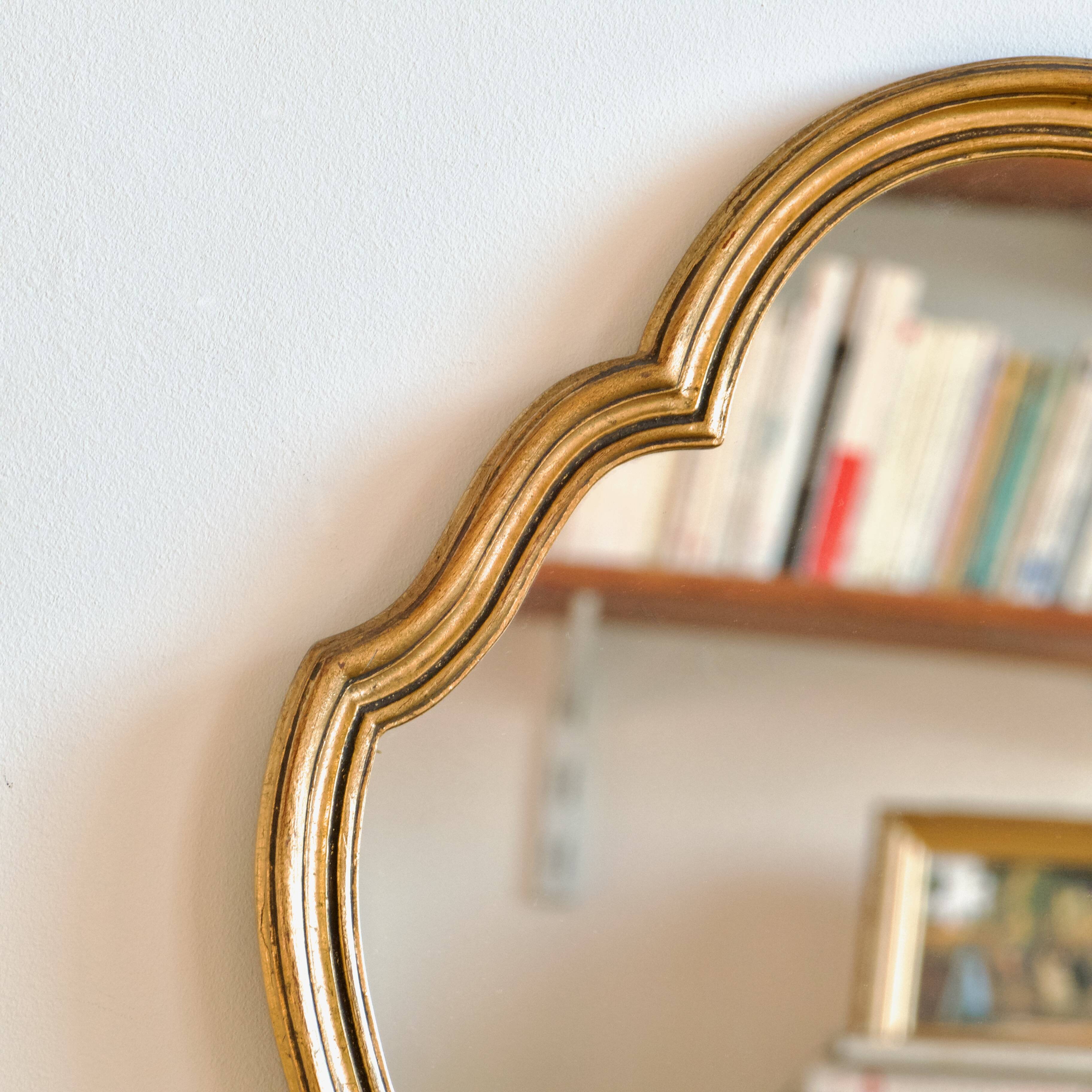 Miroir 1960 en bois doré rocaille