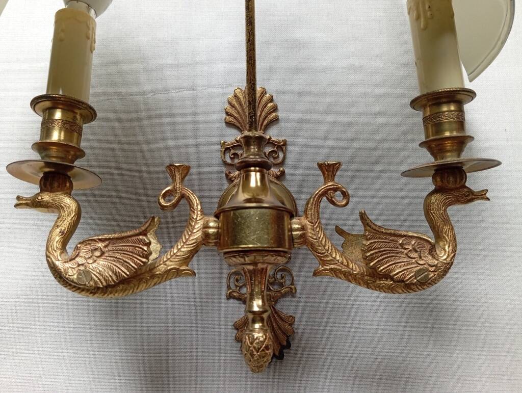 Pair of bronze and sheet metal hot water bottle wall lights