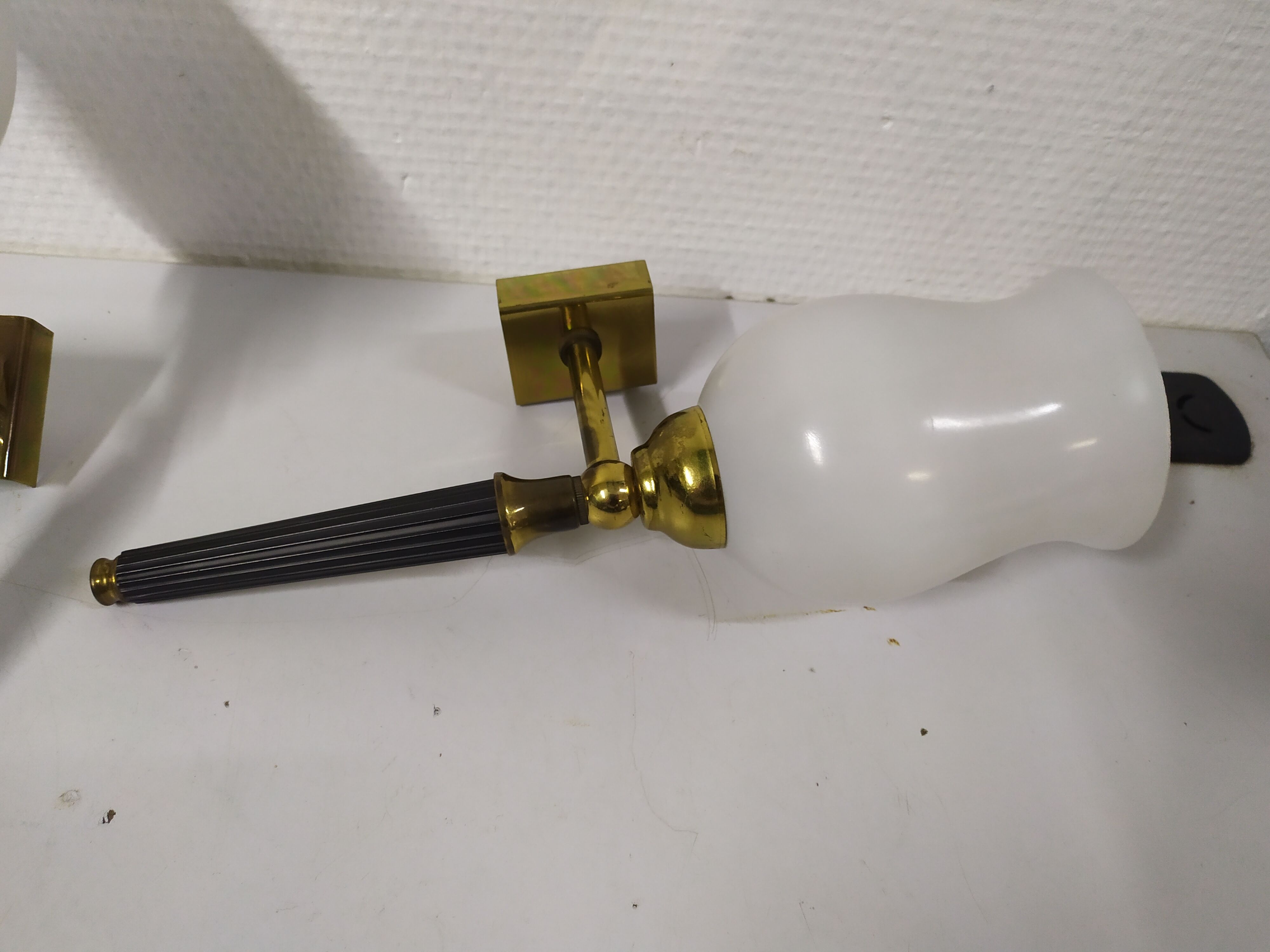 Pair of brass and white opaline wall sconces