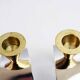 Pair of brass and chrome-plated metal candlesticks