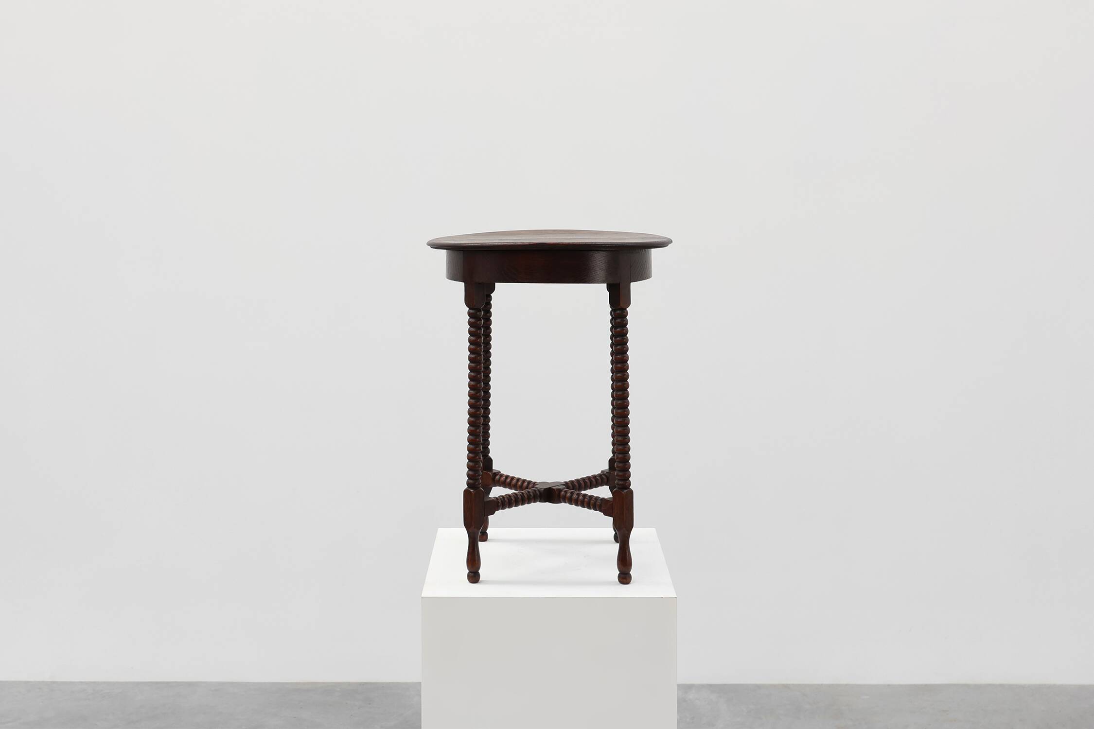 Art Deco round wooden side table with spindle legs, France circa 1900