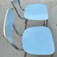 Two blue Formica "Peugeot" chairs.