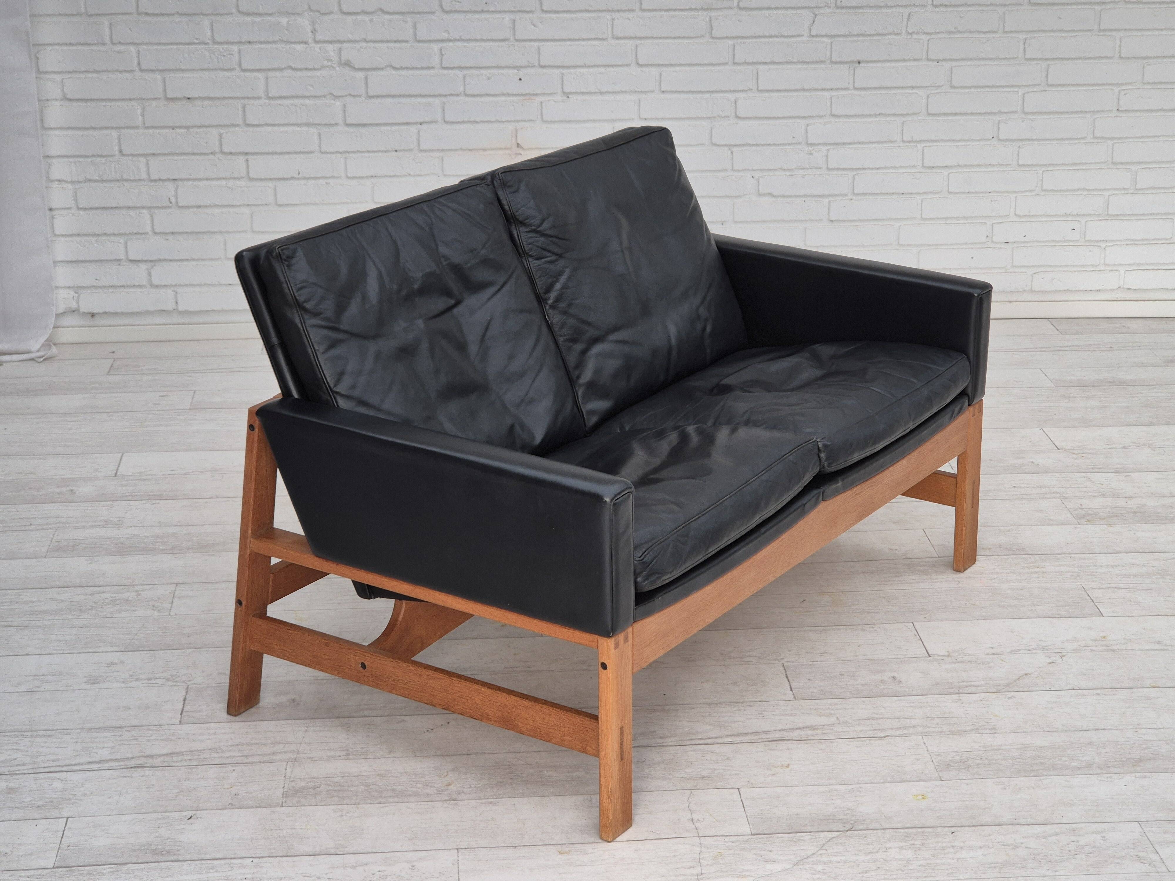 1960s, Danish 2-seater sofa in original condition, furniture leather, solid oak wood.